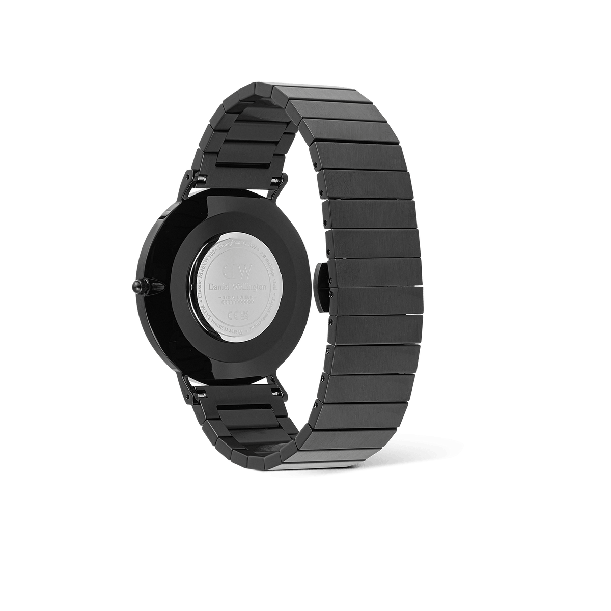 Classic Piano Link Onyx Unitone Black watch by Daniel Wellington viewed from the back, showing the brushed stainless steel piano link bracelet and engraved case back.