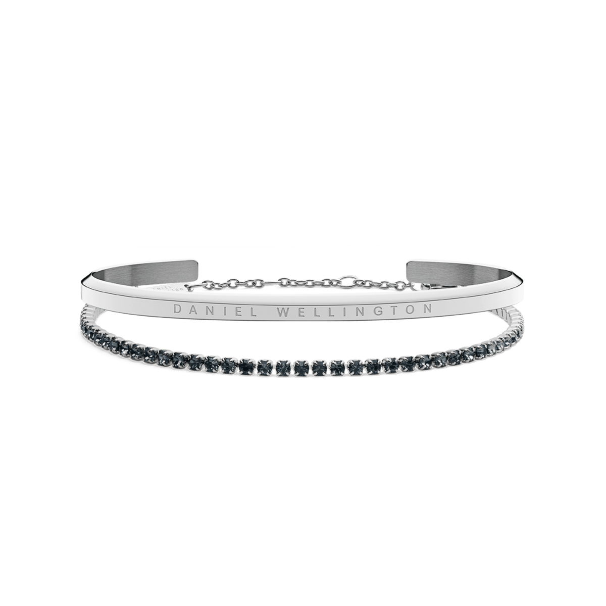 Classic Bracelet Silver and Tennis Bracelet Nightfall Silver set featuring a polished silver cuff with subtle branding and a delicate tennis bracelet adorned with deep nightfall-toned stones, displayed side by side against a plain background.