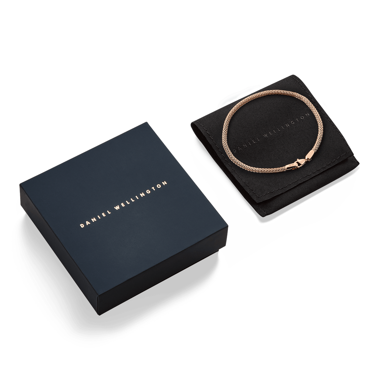 Tide Mesh Bracelet Melrose 2.8 in rose gold displayed on a black pouch next to a Daniel Wellington gift box, highlighting its elegant presentation for gifting.
