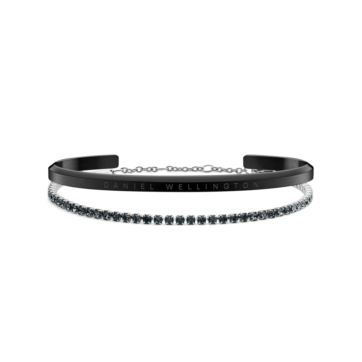 Classic Bracelet Black and Tennis Bracelet Nightfall Silver set featuring a matte black cuff with subtle branding and a silver tennis bracelet adorned with sparkling stones, displayed against a plain background.