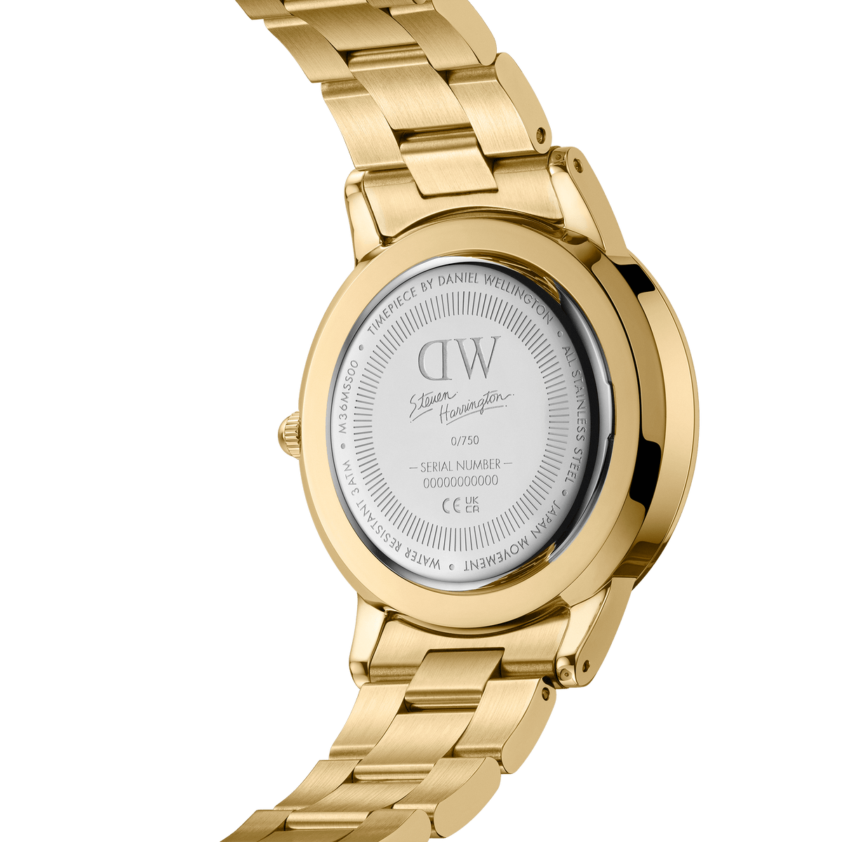 The back of the Steven Harrington x Daniel Wellington Iconic Link Dual Tone gold watch, showing the engraved limited edition details, artist signature, and serial number on the stainless steel case.