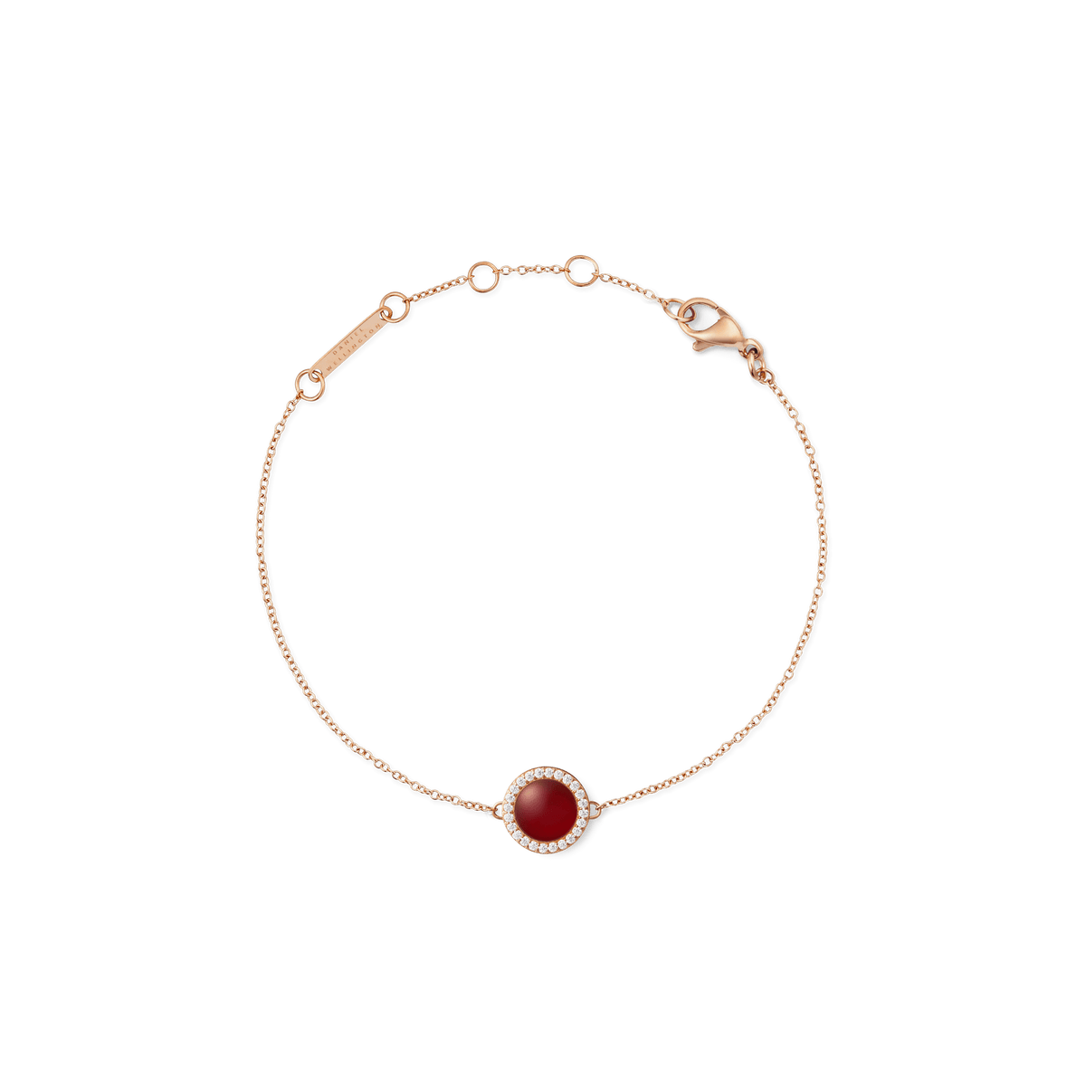 Rose gold bracelet with a slim adjustable chain, featuring a round red agate centrepiece surrounded by a halo of white cubic zirconia crystals.