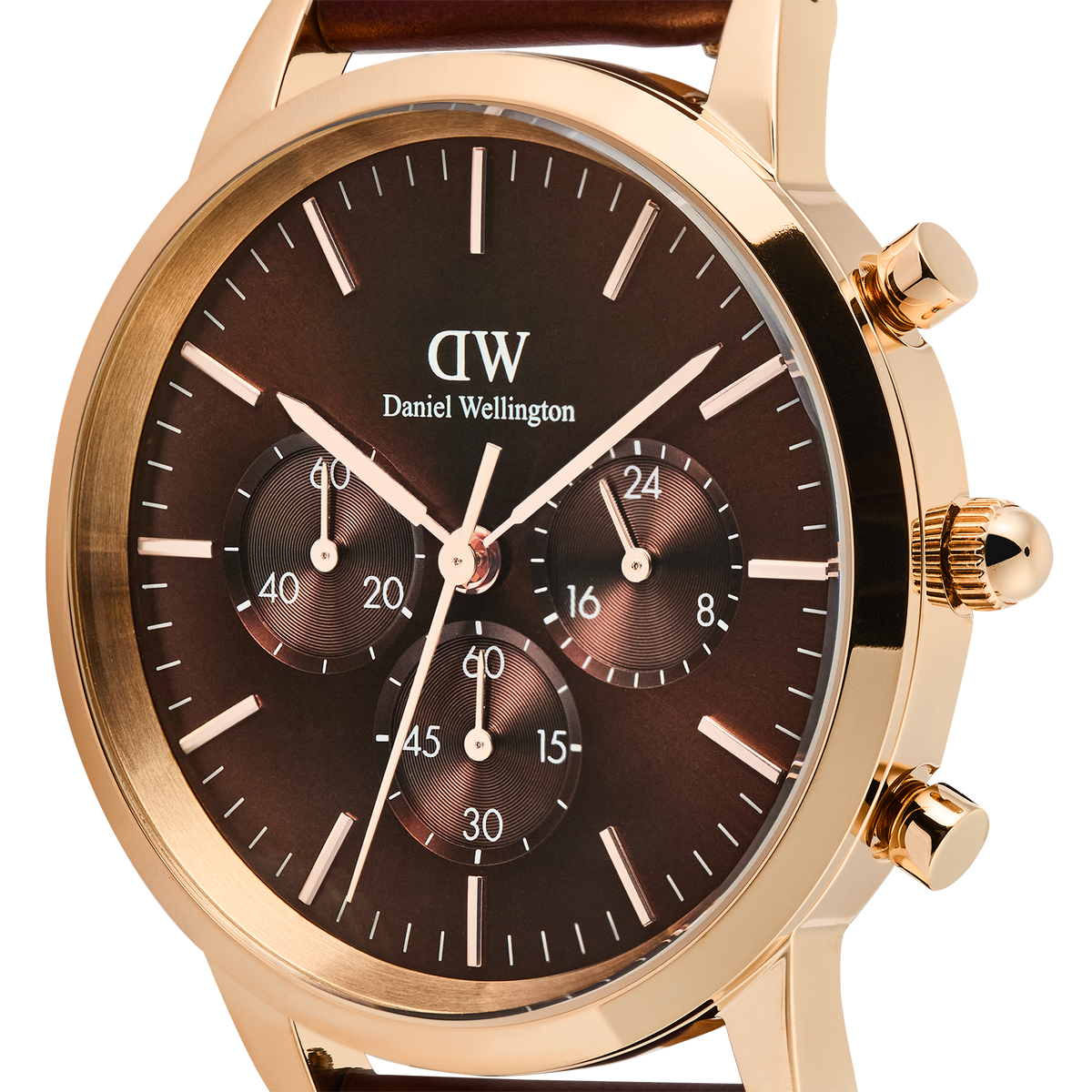 Close-up of the Iconic Chronograph St Mawes Amber RG watch, highlighting its amber sunray dial, three chronograph sub-dials, rose gold case, and minimalist hour markers.