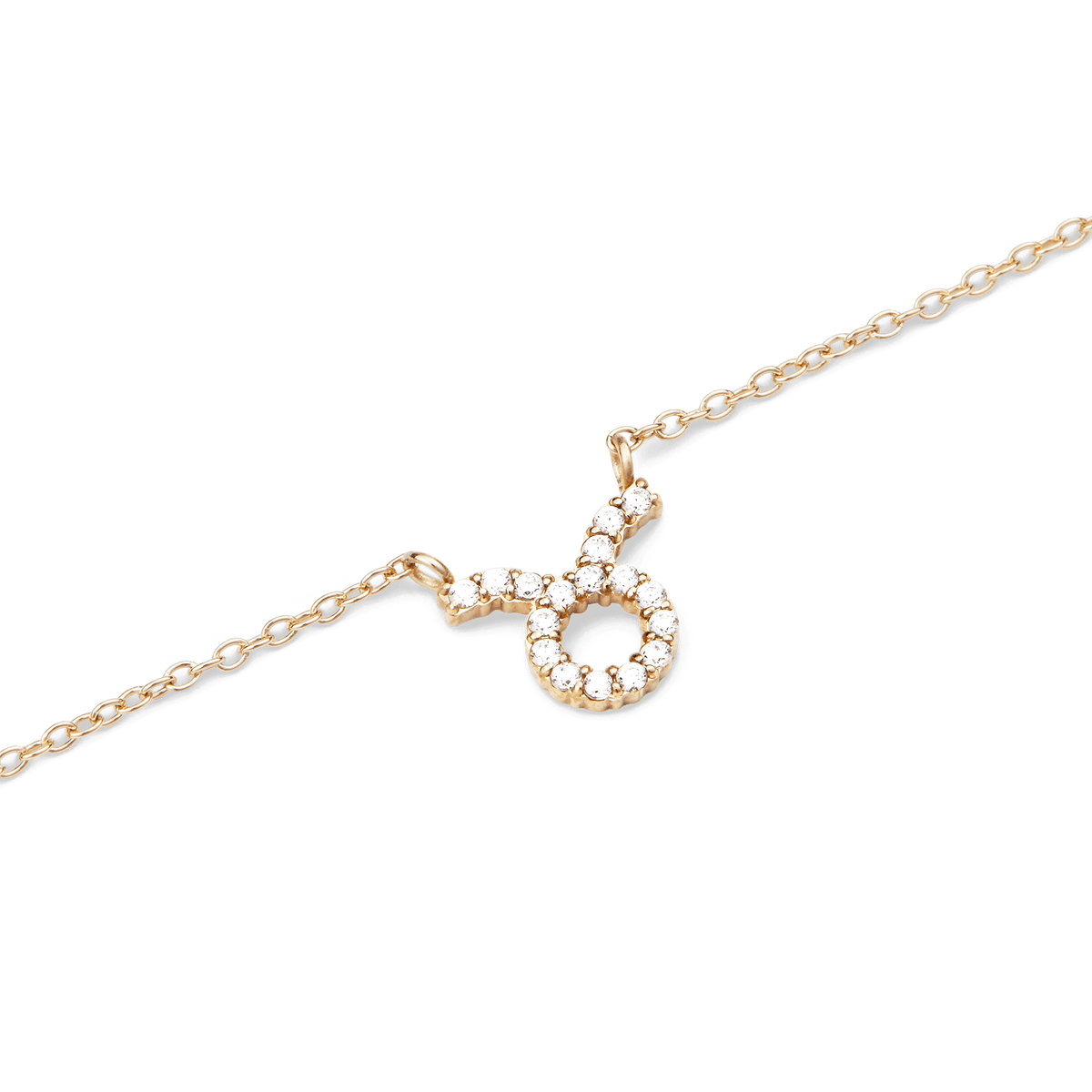 Gold chain necklace with a fixed Taurus zodiac pendant, featuring hand-placed crystals for a sparkling and refined finish.