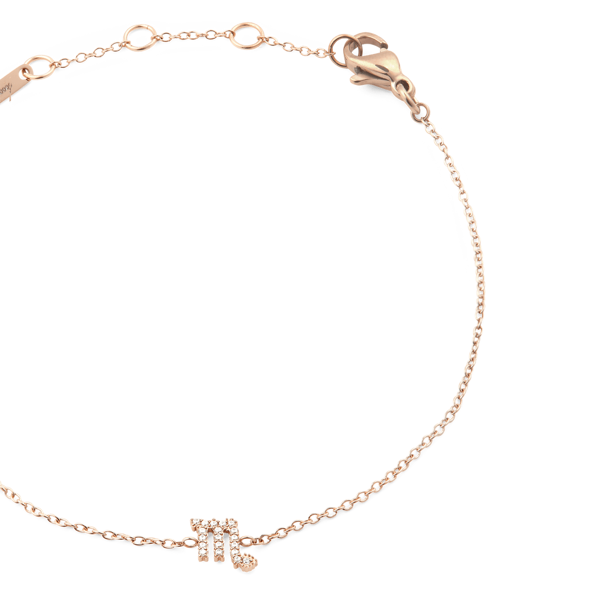 Close-up of the Crystal Zodiac Chain Bracelet Rose Gold, featuring a slim rose gold chain, adjustable sizing rings, and a crystal-set Scorpio zodiac pendant.