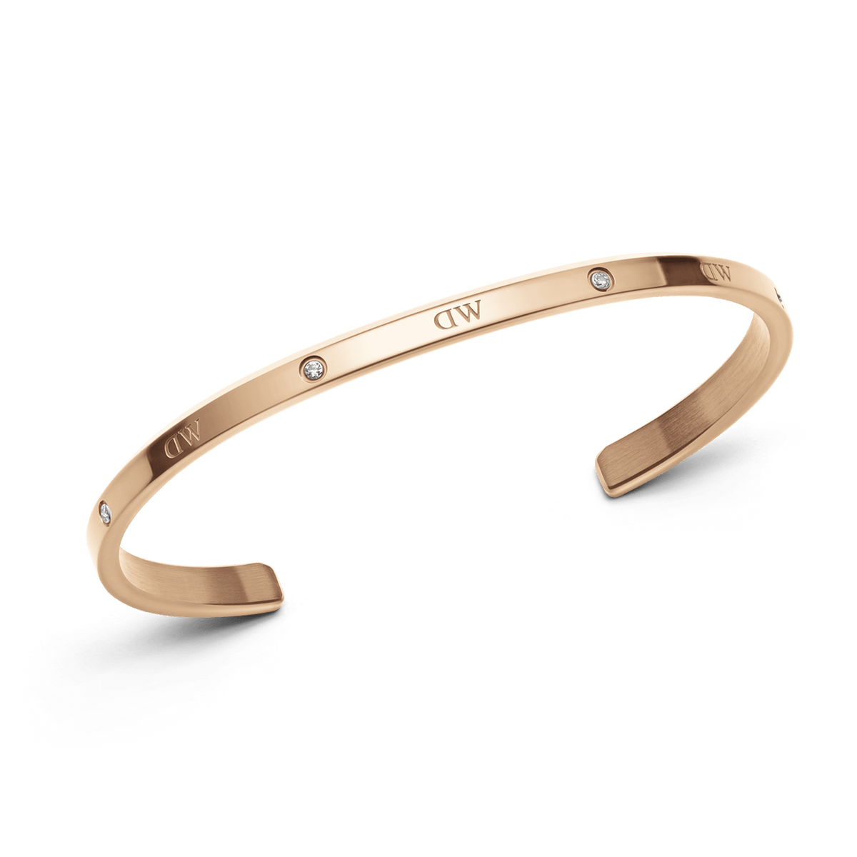 Classic Lumine Bracelet RG in rose gold, featuring a slim adjustable cuff with six sparkling crystals and a smooth, minimalist finish suitable for everyday wear or layering with other jewellery.