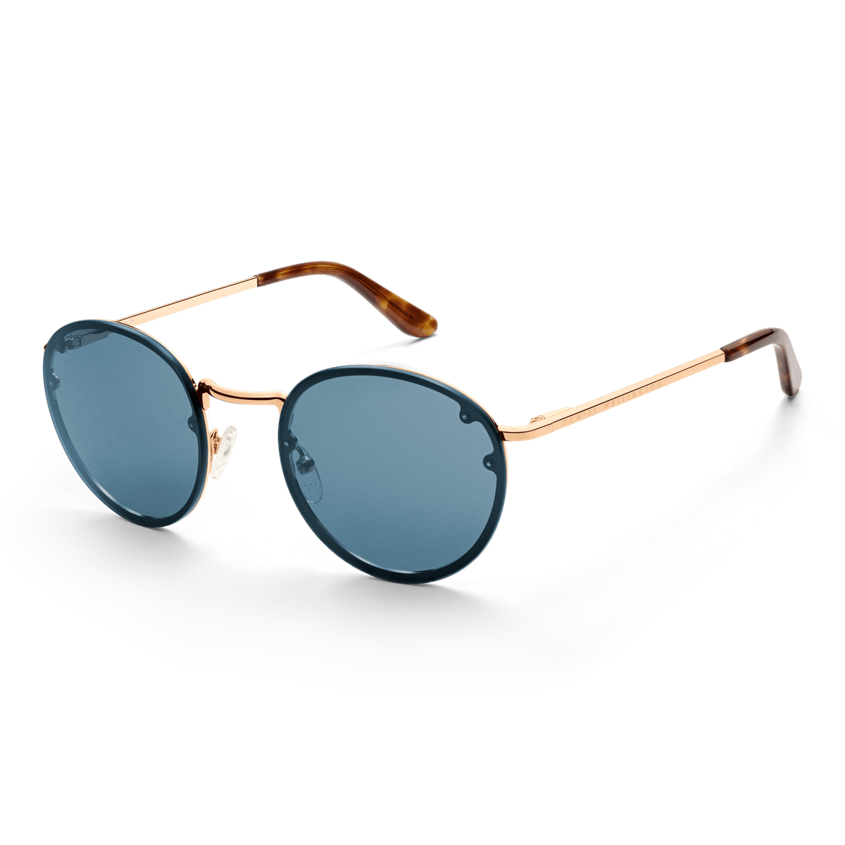 Arch Steel Blue Rose Gold sunglasses featuring round blue UV400 nylon lenses, a rose gold plated stainless steel frame, and tortoiseshell acetate temple tips, shown at an angle.