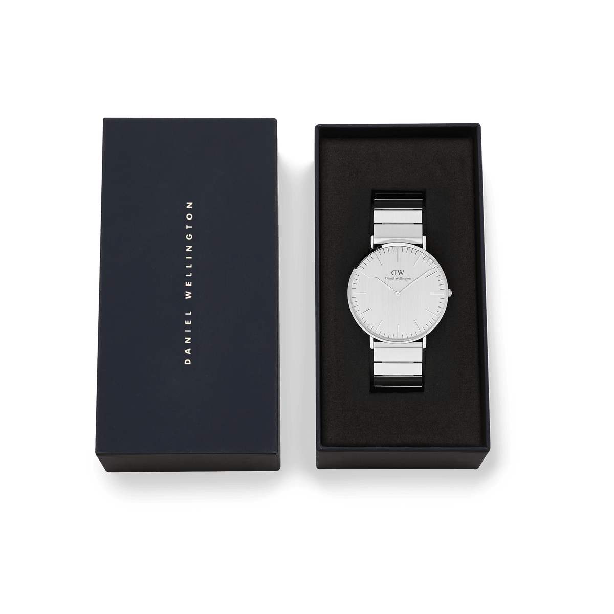 Classic Piano Link Silver Unitone men's watch with a brushed silver dial and stainless steel bracelet, presented in a sleek black Daniel Wellington gift box.