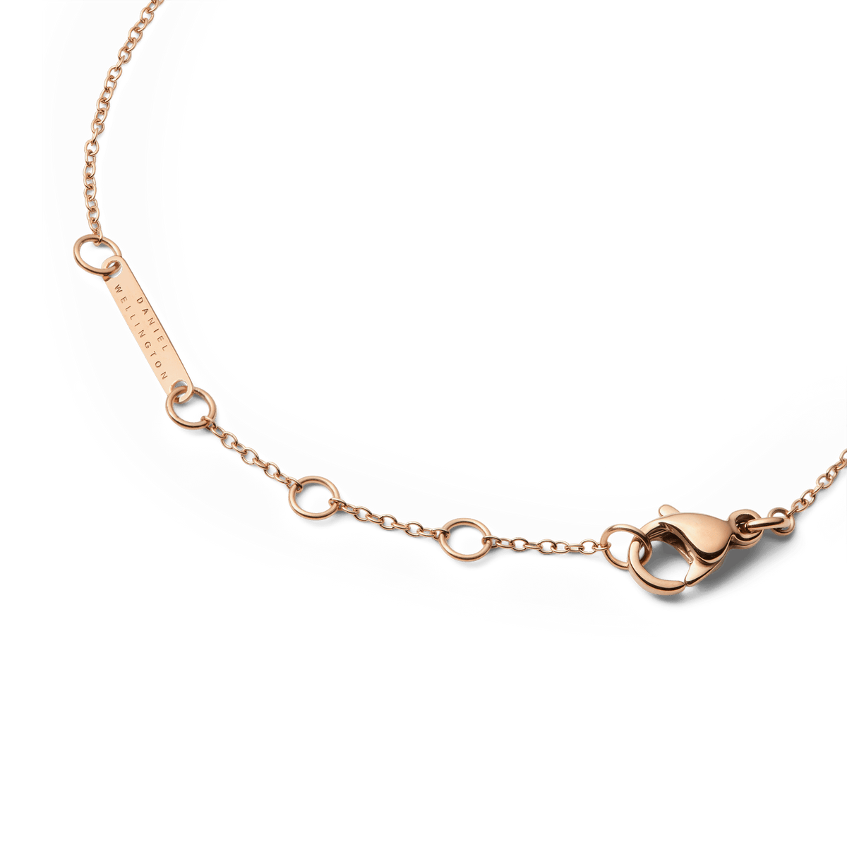 Detail of the Audrey Bracelet Tiger Eye Rose Gold showing the adjustable rose gold chain with multiple sizing loops, a secure lobster clasp, and a branded tag for a comfortable and personalised fit.