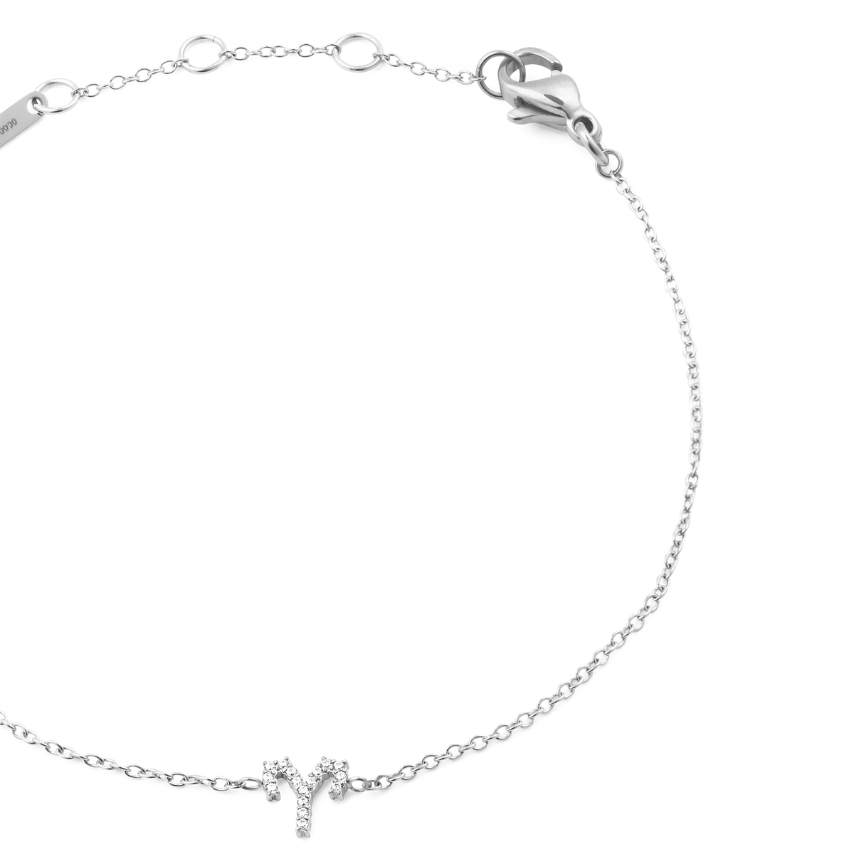 Close-up of the Crystal Zodiac Chain Bracelet Silver featuring a fine adjustable chain and an Aries zodiac charm adorned with sparkling crystals.