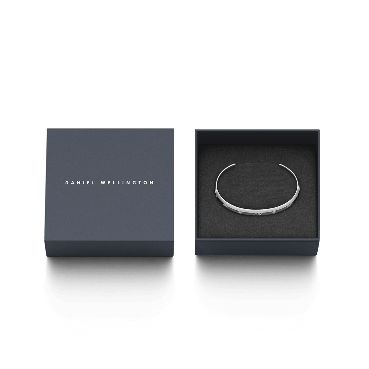 Classic Lumine Bracelet S displayed in a Daniel Wellington gift box, highlighting its slim silver cuff with sparkling crystals as a stylish and elegant gifting option.