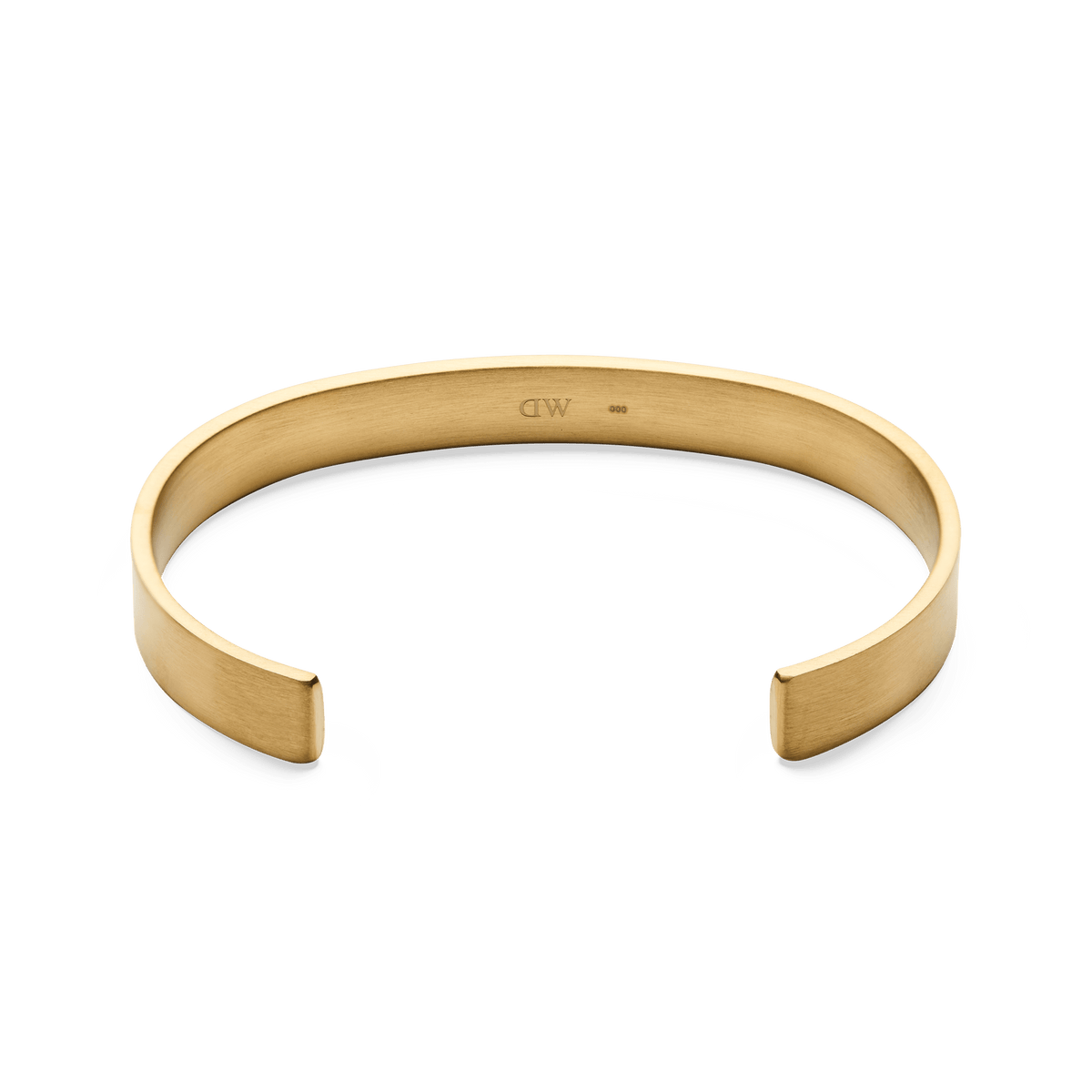 Line Cuff Brushed Gold shown from above, highlighting its open cuff shape, brushed gold finish, and smooth contoured edges for a comfortable fit.