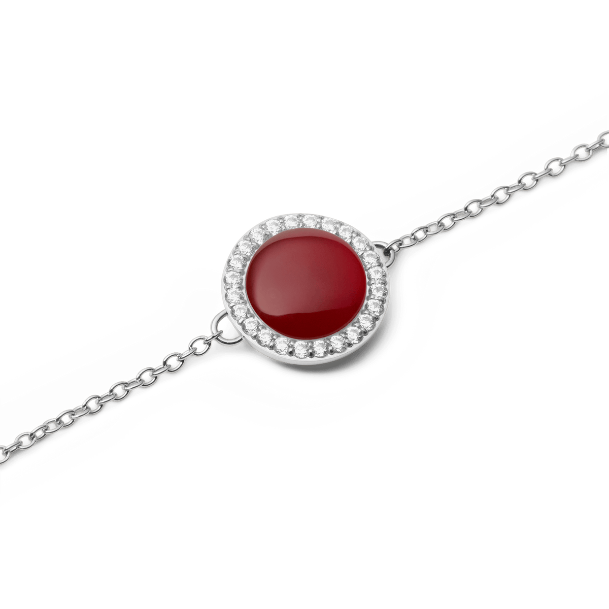 Close-up of the Audrey Bracelet Red Agathe Silver, showing the domed red agate centrepiece encircled by sparkling white cubic zirconia crystals on a fine silver chain.