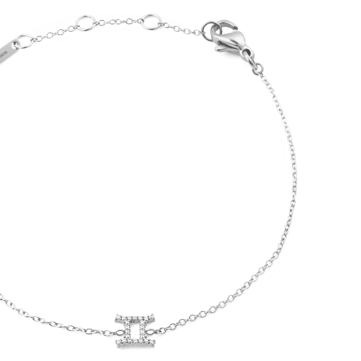 Close-up of the Crystal Zodiac Chain Bracelet Silver, featuring a fine adjustable silver chain and a Gemini zodiac charm set with sparkling crystals.