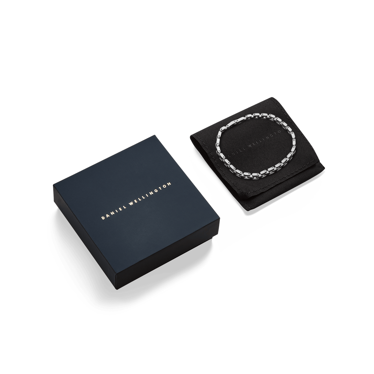 3-Link Bracelet Silver displayed on a black pouch next to a navy Daniel Wellington gift box, highlighting its polished geometric links and elegant presentation for gifting.