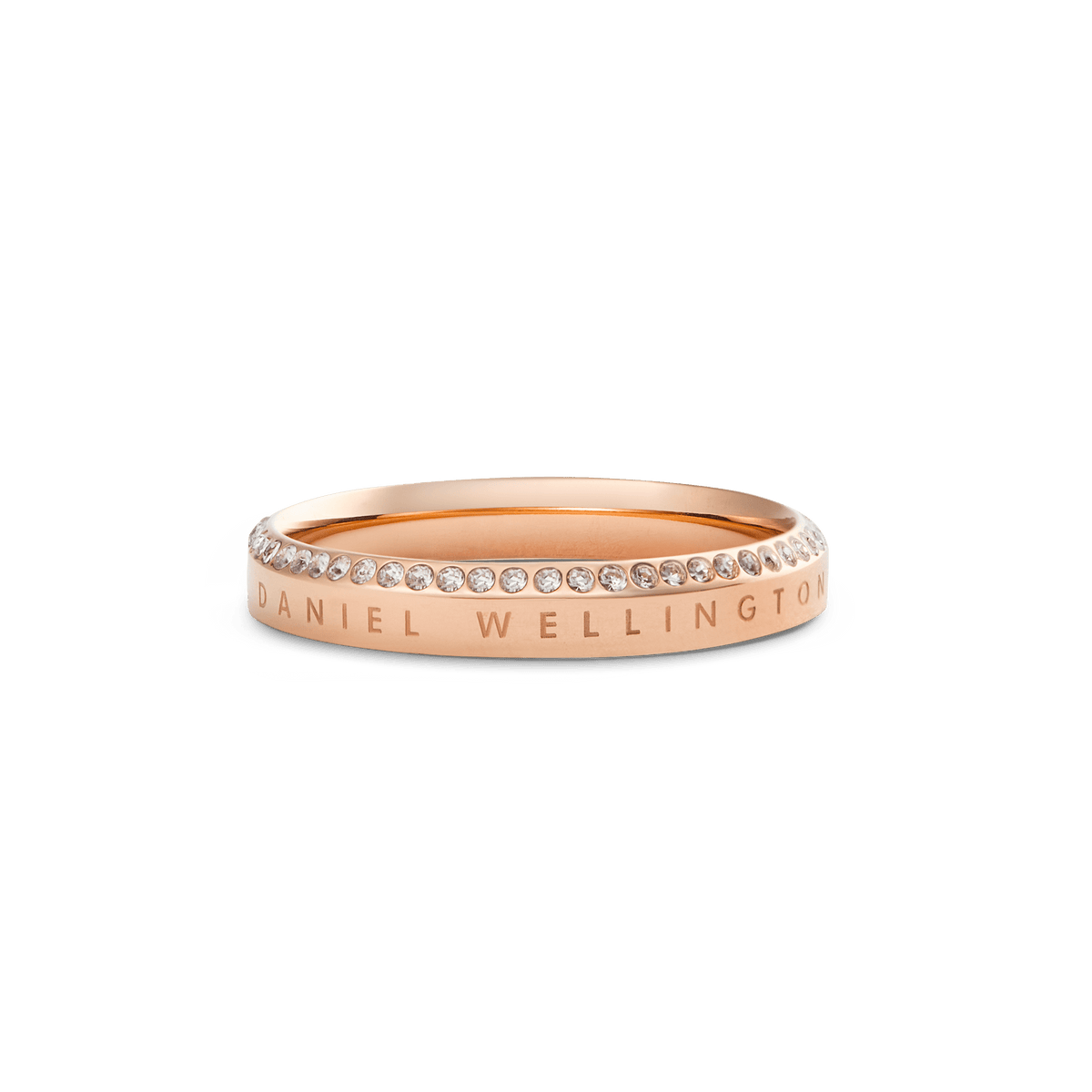 Classic Aura Ring Rose Gold featuring a slim rose gold band with a row of white crystals set along the chamfered edge and subtle engraved branding for a refined, elegant finish.