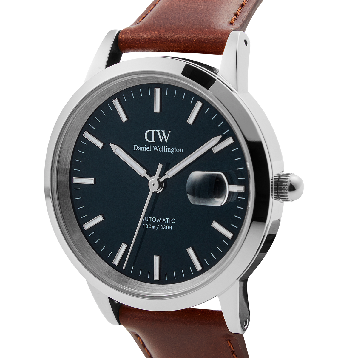 Close-up of the Iconic St Mawes Automatic Silver watch featuring a polished silver case, arctic blue enamel dial with glow-in-the-dark markers, and a brown Italian leather strap.