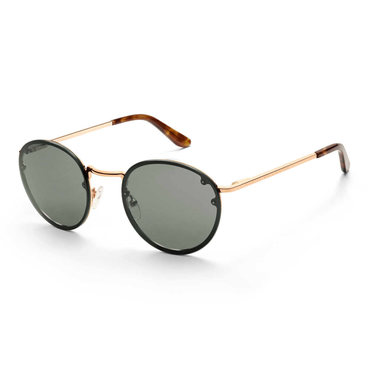 Arch Steel Green Rose Gold sunglasses featuring round green UV400 lenses, a rose gold plated stainless steel frame, and tortoiseshell acetate temple tips, shown from a side angle to highlight their modern classic design.