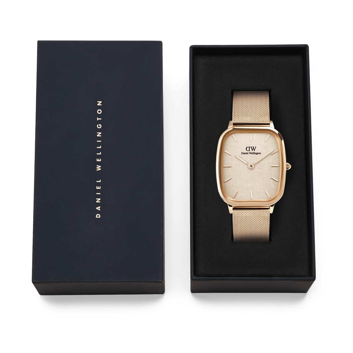 Marlon Melrose Linen men’s watch with a rose gold cushion-shaped case and mesh strap, presented in a black Daniel Wellington gift box.