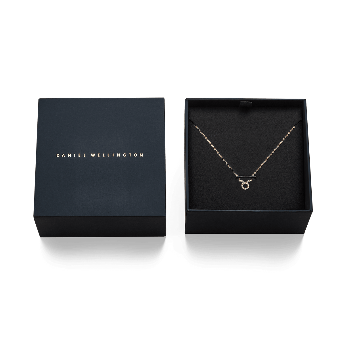 Crystal Zodiac Chain Necklace Gold with a Taurus pendant set with sparkling crystals, presented in an elegant Daniel Wellington gift box.