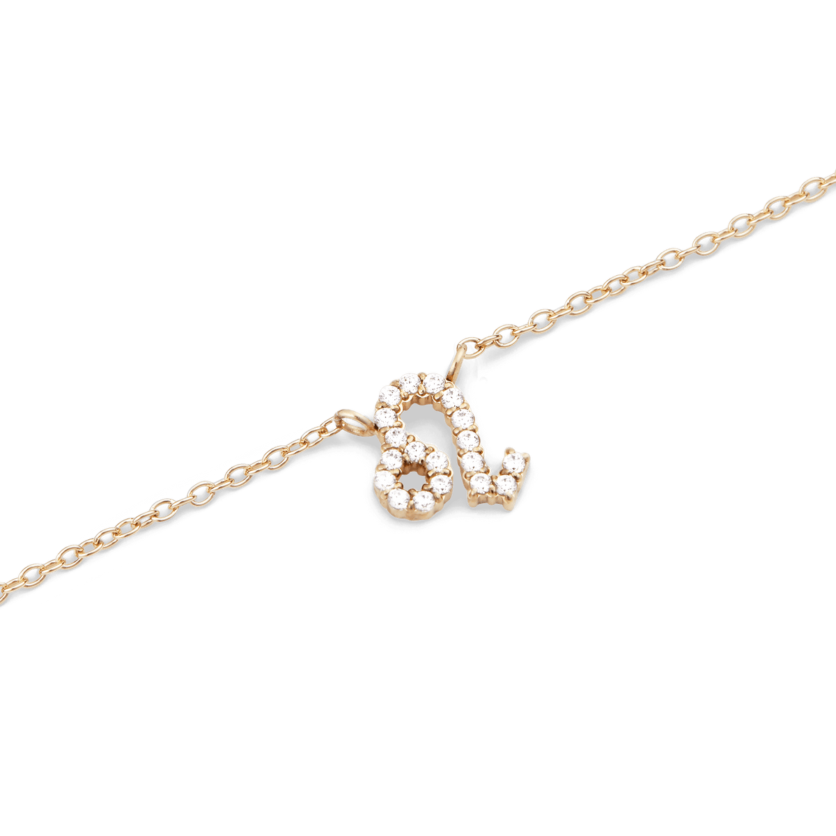 Close-up of the Crystal Zodiac Chain Necklace Gold featuring a Leo zodiac pendant set with sparkling crystals on a fine gold chain.