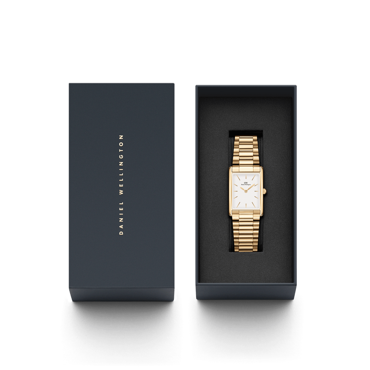 Bound 3-Link Gold rectangular wristwatch with a gold 3-link bracelet and white dial, elegantly presented in a branded Daniel Wellington gift box.