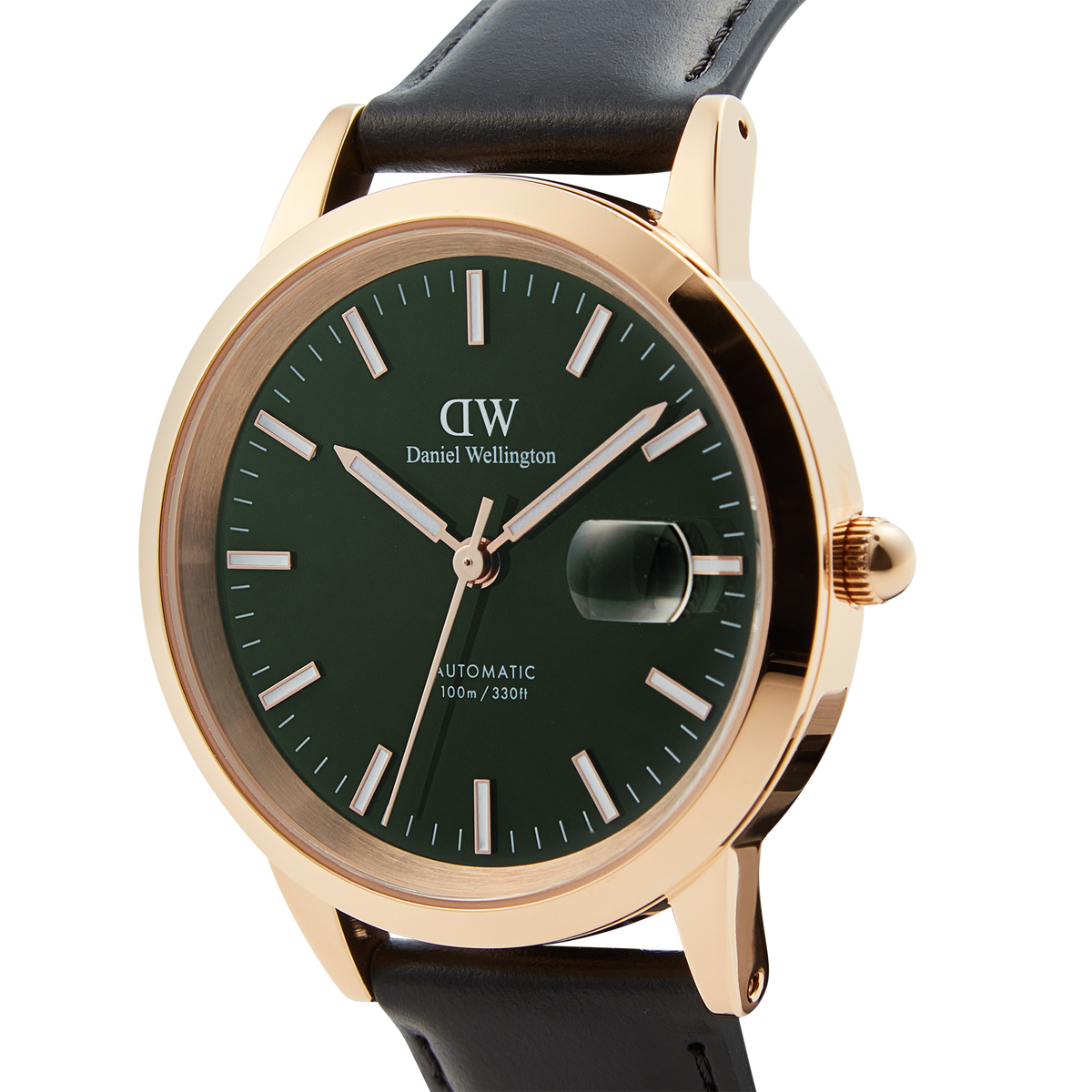 Close-up of the Daniel Wellington Iconic Sheffield Automatic Rose Gold watch, showing its emerald green enamel dial, rose gold case, luminous markers, and black leather strap.