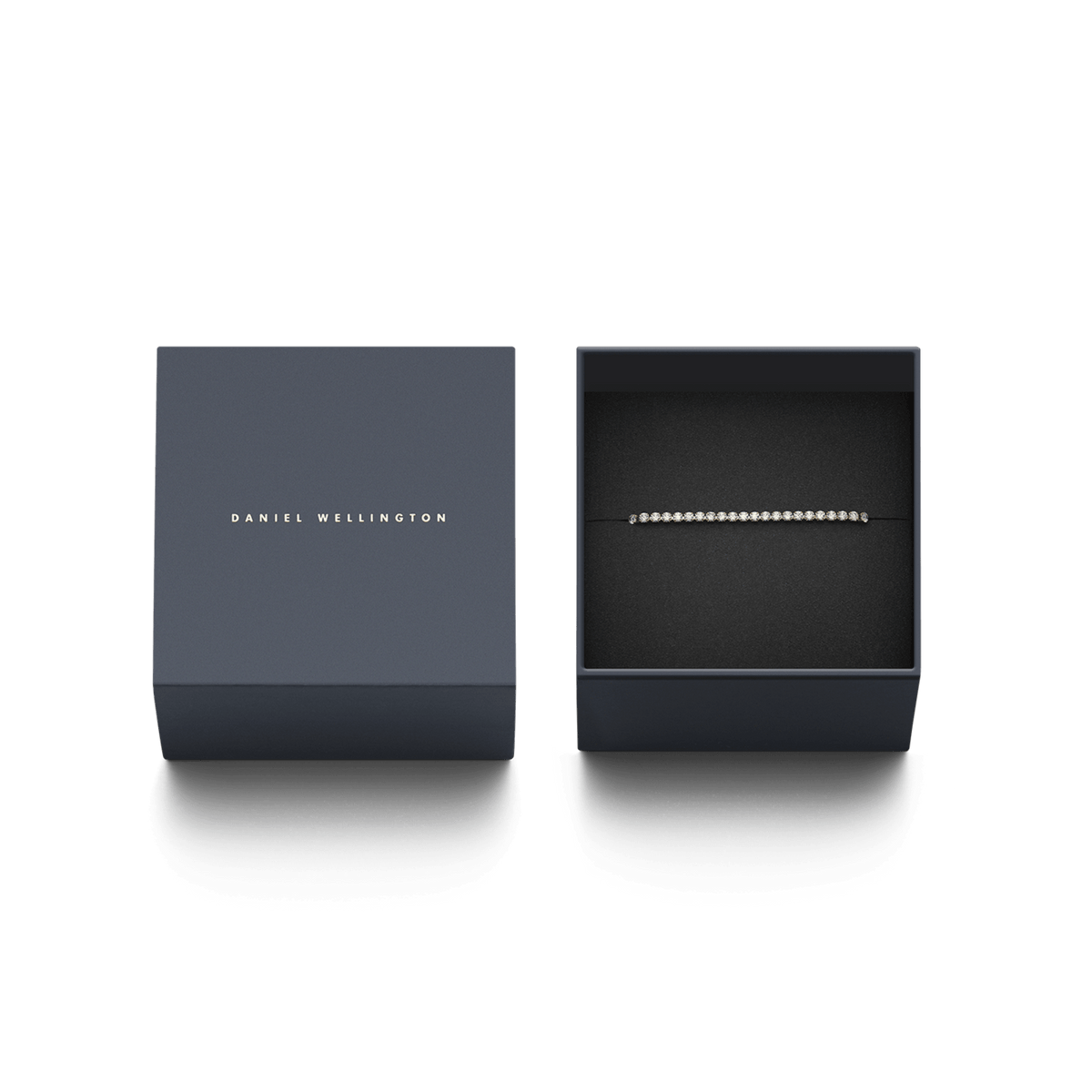 Classic Tennis Necklace Gold presented in a navy Daniel Wellington gift box, highlighting its sparkling crystal design and elegant packaging, ideal for gifting.