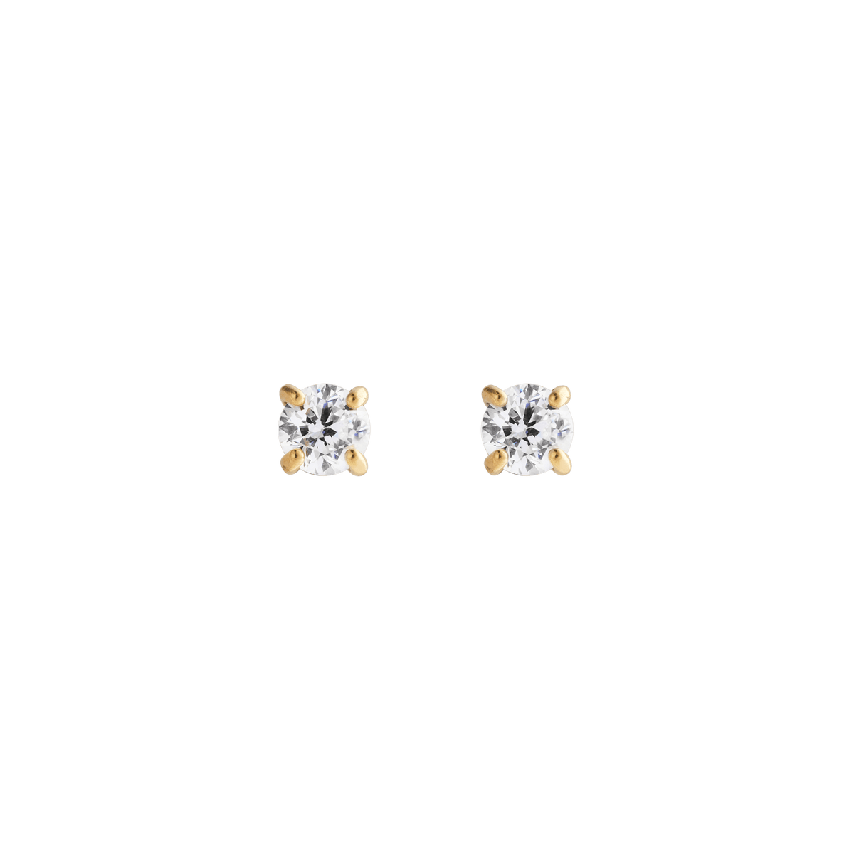 A pair of Mirelle Solitaire Stud Earrings in gold, each featuring a petite white cubic zirconia crystal set in a classic four-prong gold setting, shown against a plain background.