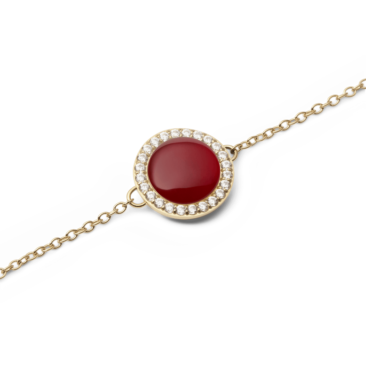 Close-up of the Audrey Bracelet Red Agathe Gold, showing the domed red agate centrepiece encircled by sparkling white cubic zirconia crystals on a fine gold chain.