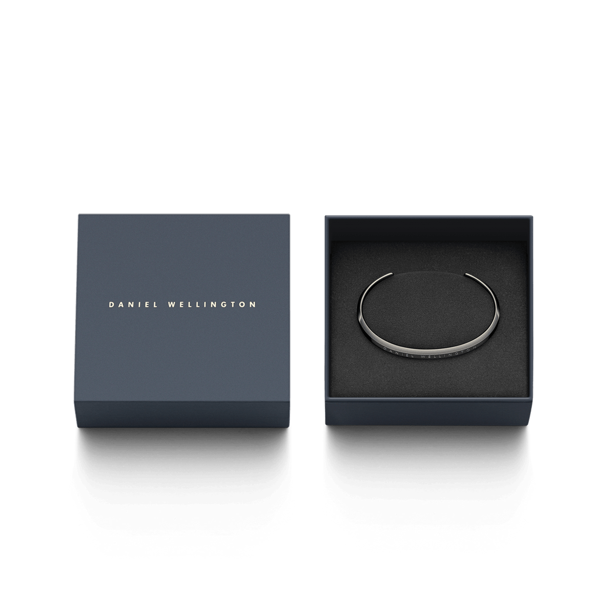 Classic Bracelet Graphite by Daniel Wellington presented in elegant packaging, featuring a slim graphite cuff with engraved branding, ideal as a stylish gift for everyday wear.