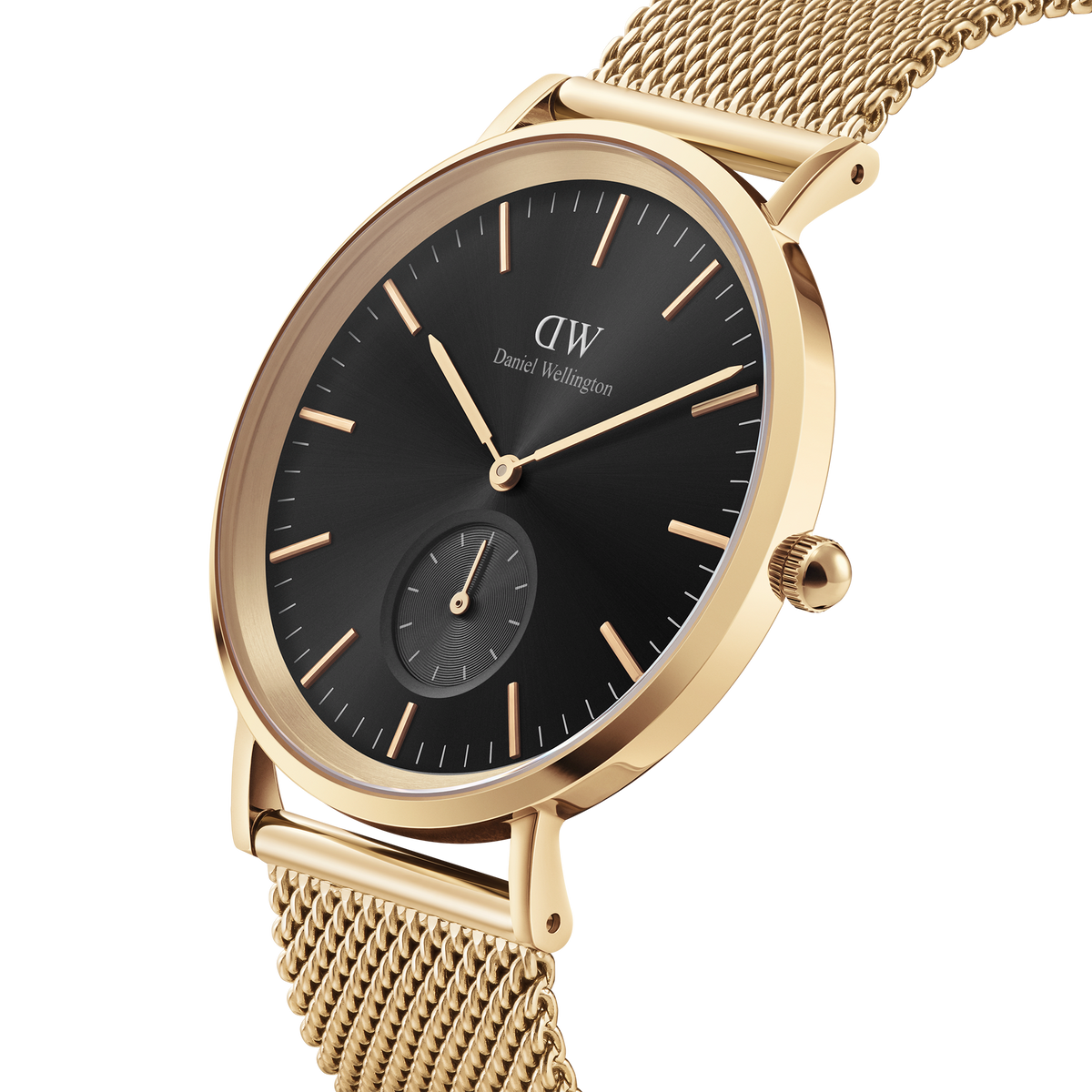 Classic Multi-Eye Evergold Onyx men's watch with a black multi-eye dial, gold hour markers, and a gold mesh strap, shown in a close-up angle highlighting its minimalist design and polished PVD gold finish.