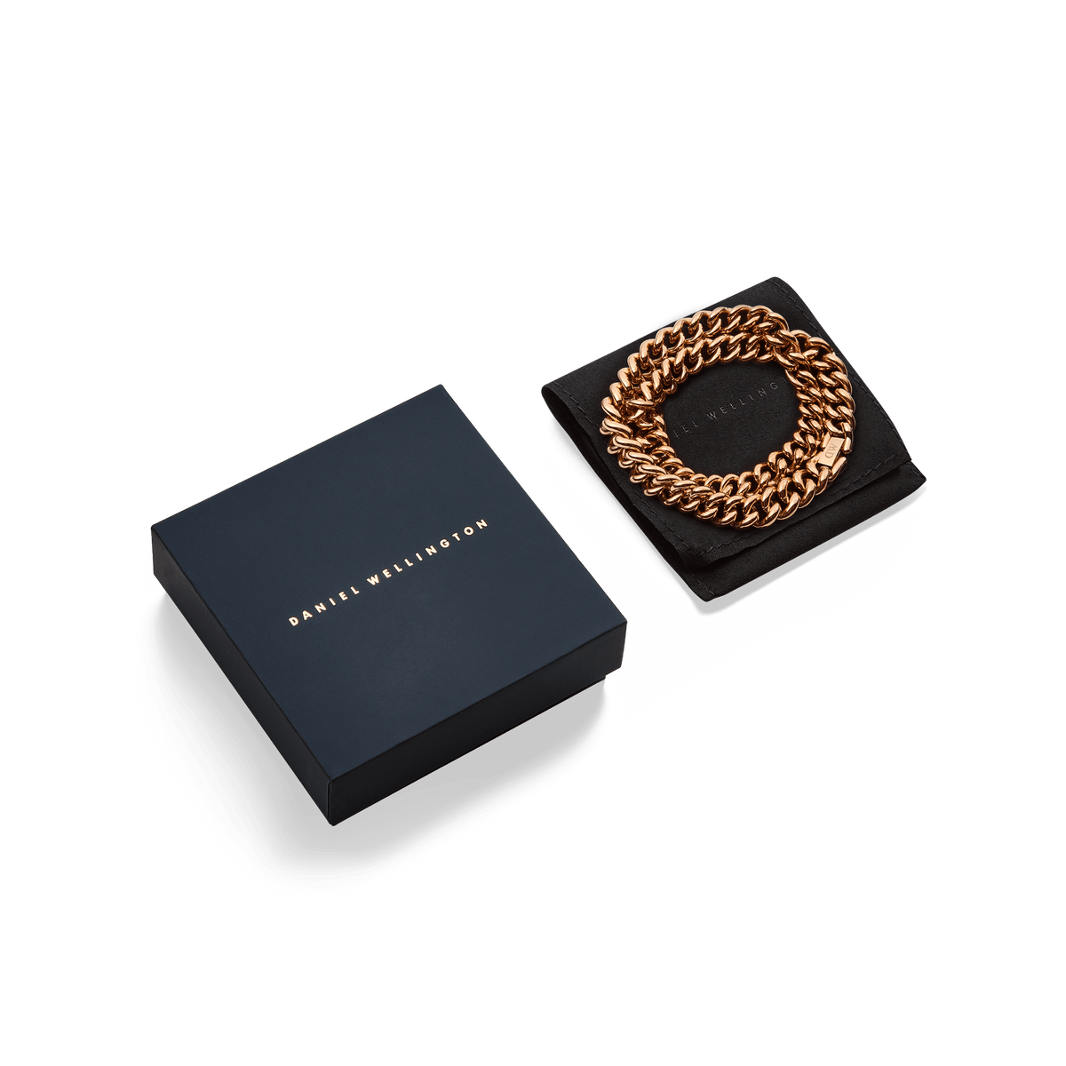 Chunky Chain Necklace Rose Gold presented coiled on a black pouch next to a sleek Daniel Wellington gift box, highlighting its bold rose gold links and elegant packaging, ideal for gifting.