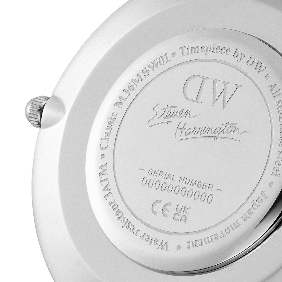 Close-up of the back of the Steven Harrington x Daniel Wellington limited edition watch, featuring engraved branding, artist signature, and unique serial number on a stainless steel case.