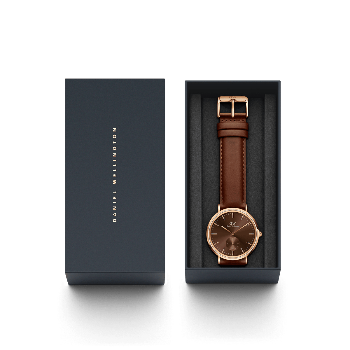Classic Multi-Eye St Mawes Amber Rose Gold men's watch presented in a sleek Daniel Wellington gift box, featuring a rose gold case, amber brown dial, and genuine brown leather strap, ideal for gifting or everyday wear.