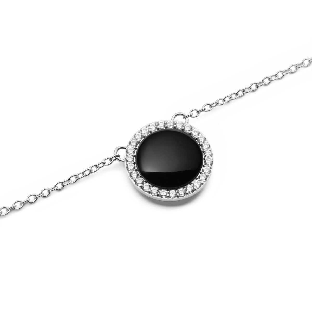 Close-up of the Audrey Necklace Black Agathe Silver, featuring a domed black agate pendant encircled by white cubic zirconia crystals on a polished silver chain.