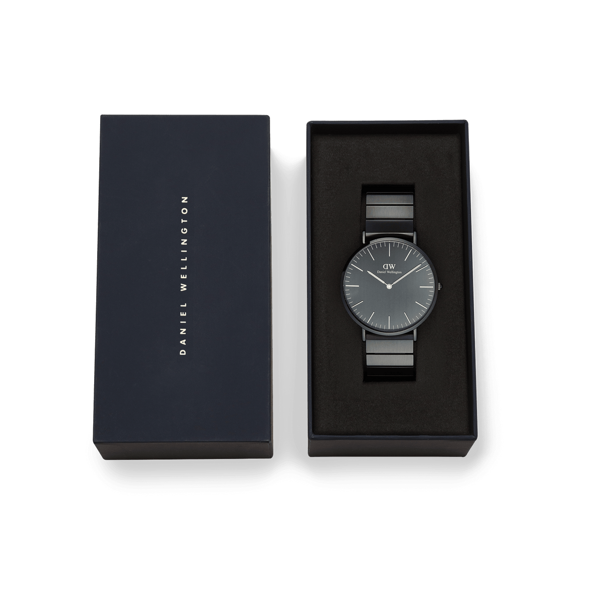 Classic Piano Link Onyx Unitone Black watch by Daniel Wellington presented in its original gift box, featuring a brushed black dial and matching stainless steel piano link bracelet.