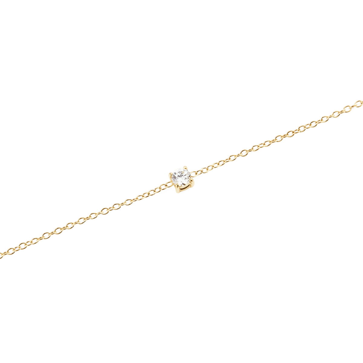 Close-up of the Mirelle Solitaire Bracelet Gold, highlighting the fine gold chain and the single white cubic zirconia stone set in a minimalist style.