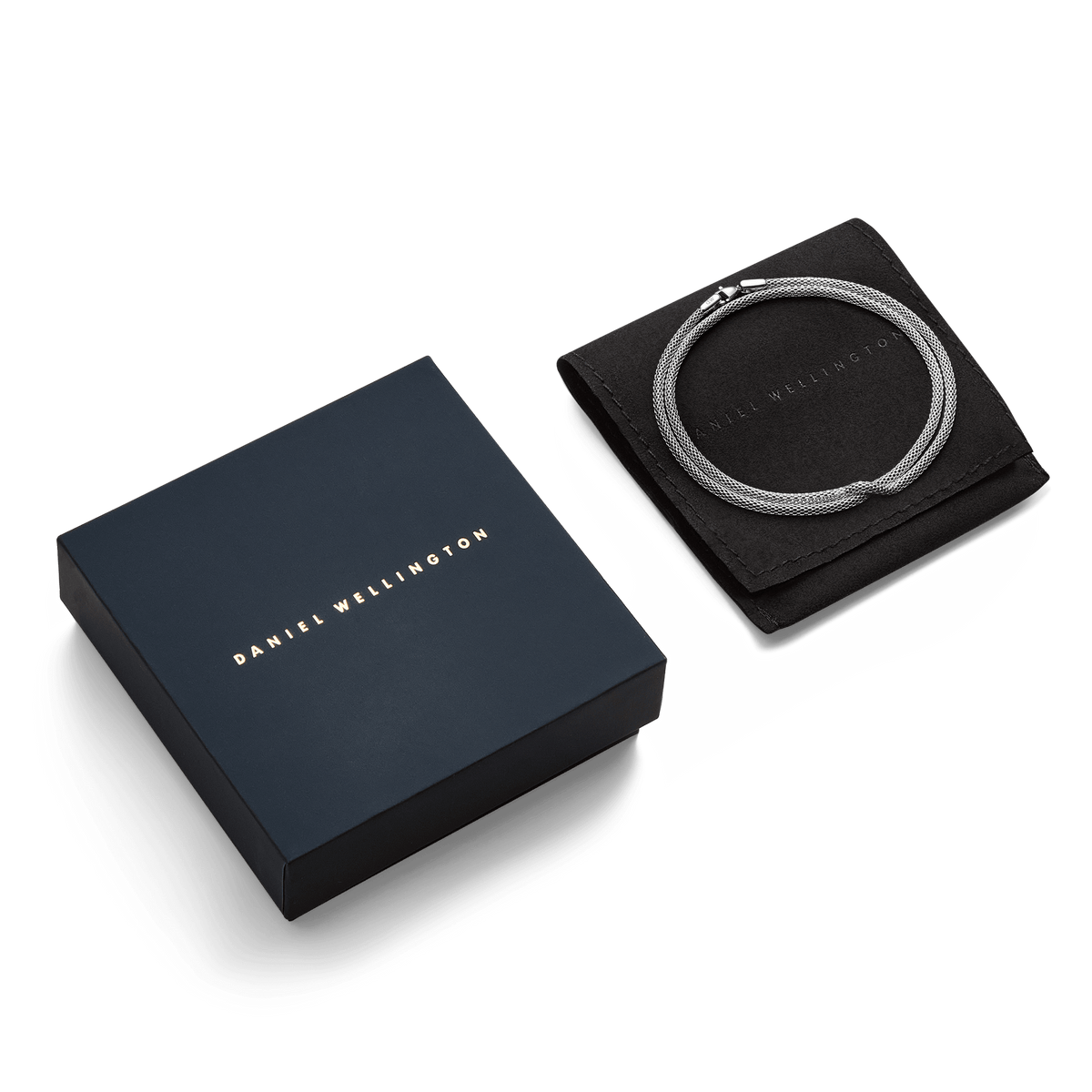 Tide Mesh Necklace Silver 2.8 displayed coiled on a black pouch next to a navy Daniel Wellington gift box, highlighting its polished silver mesh chain and elegant presentation for gifting.
