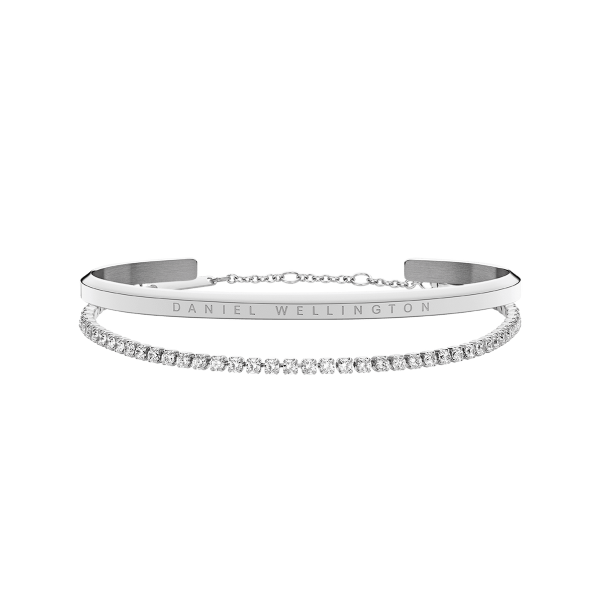 Classic & Tennis Bracelet Silver set featuring a polished minimalist silver cuff with engraved branding and a delicate tennis bracelet adorned with sparkling stones, both designed for elegant layering.