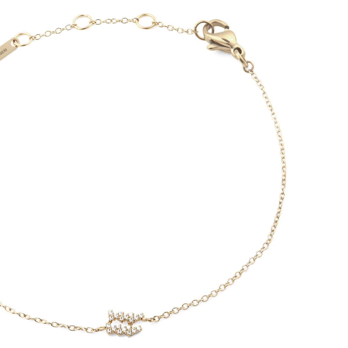 Crystal Zodiac Chain Bracelet Gold featuring a slim gold chain, adjustable sizing rings, and a sparkling crystal zodiac charm, finished with a lobster clasp for comfortable wear.