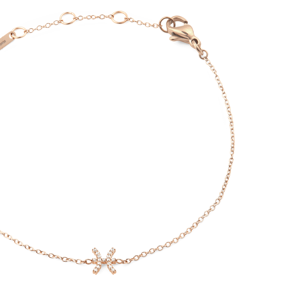 Close-up of the Crystal Zodiac Chain Bracelet Rose Gold, showing the adjustable rose gold chain, secure lobster clasp, and a sparkling crystal-set Pisces zodiac pendant.