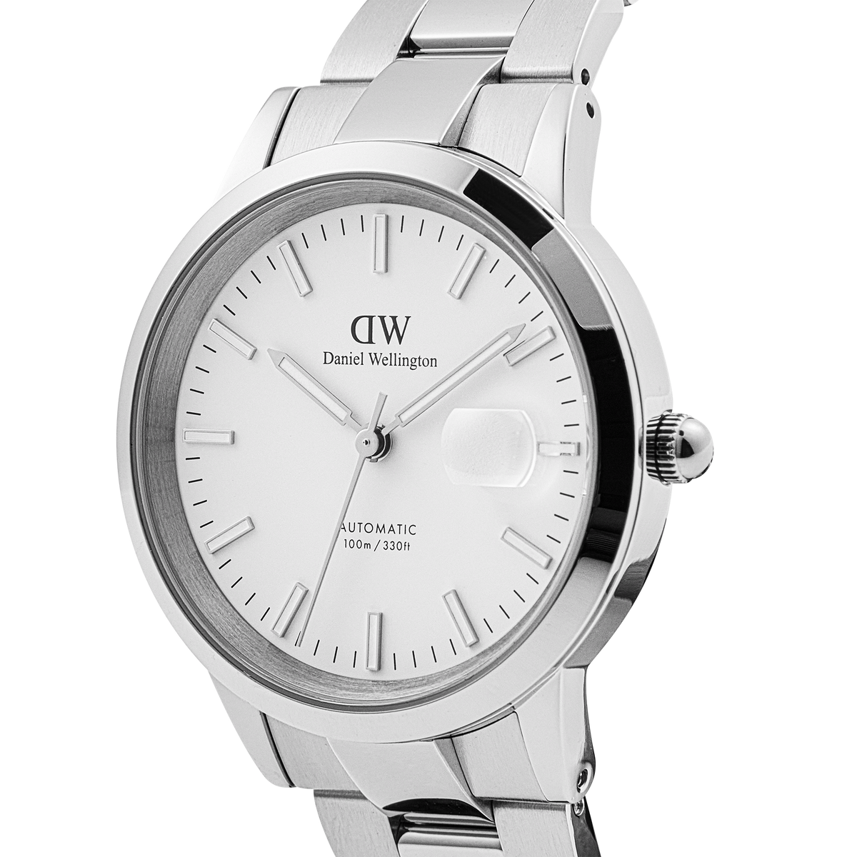 Daniel Wellington Iconic Link Automatic Silver men’s watch with a stainless steel bracelet, minimalist white enamel dial, glow-in-the-dark markers, and a magnified date window, shown from a side angle.