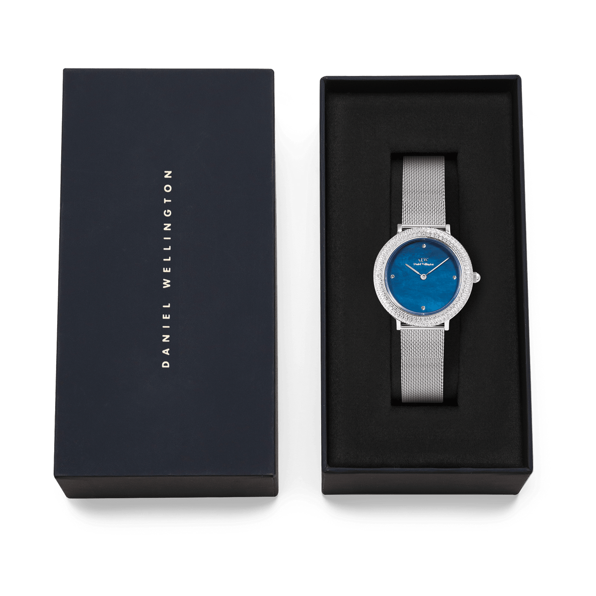 Daniel Wellington Crystalline Bezel Sterling Blue ladies watch with a blue mother of pearl dial and silver mesh strap, presented in a branded gift box.