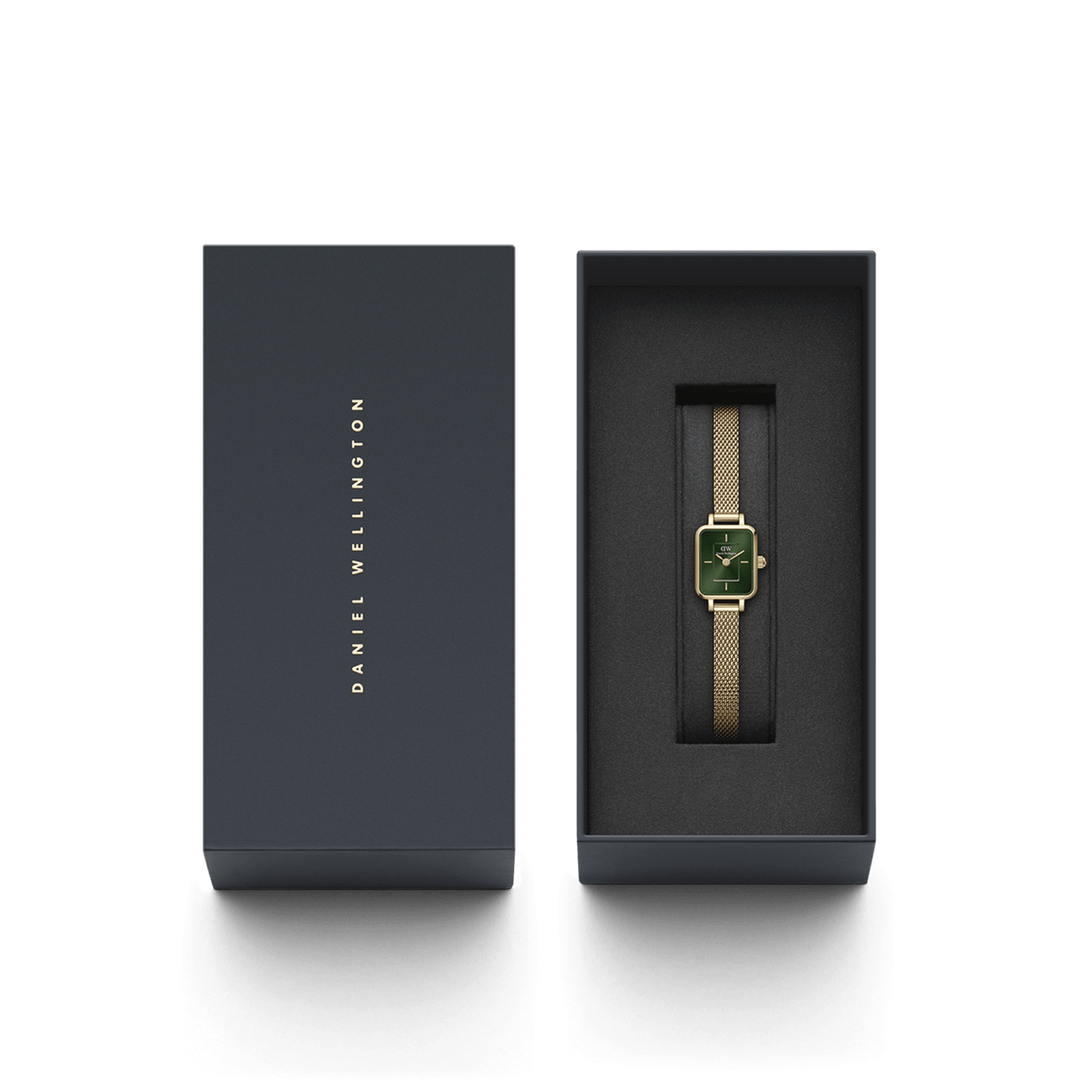 Quadro Mini Evergold Emerald gold watch with emerald green dial and mesh strap, elegantly presented in a Daniel Wellington branded gift box.