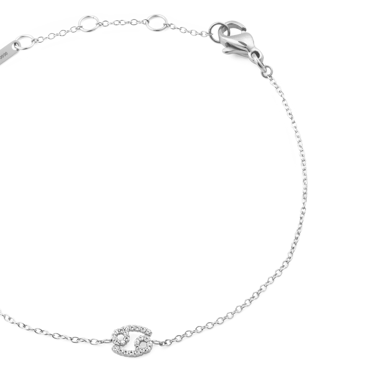 Close-up of the Crystal Zodiac Chain Bracelet Silver showing a delicate silver chain with adjustable sizing rings, a lobster clasp, and a Cancer zodiac charm set with sparkling crystals.