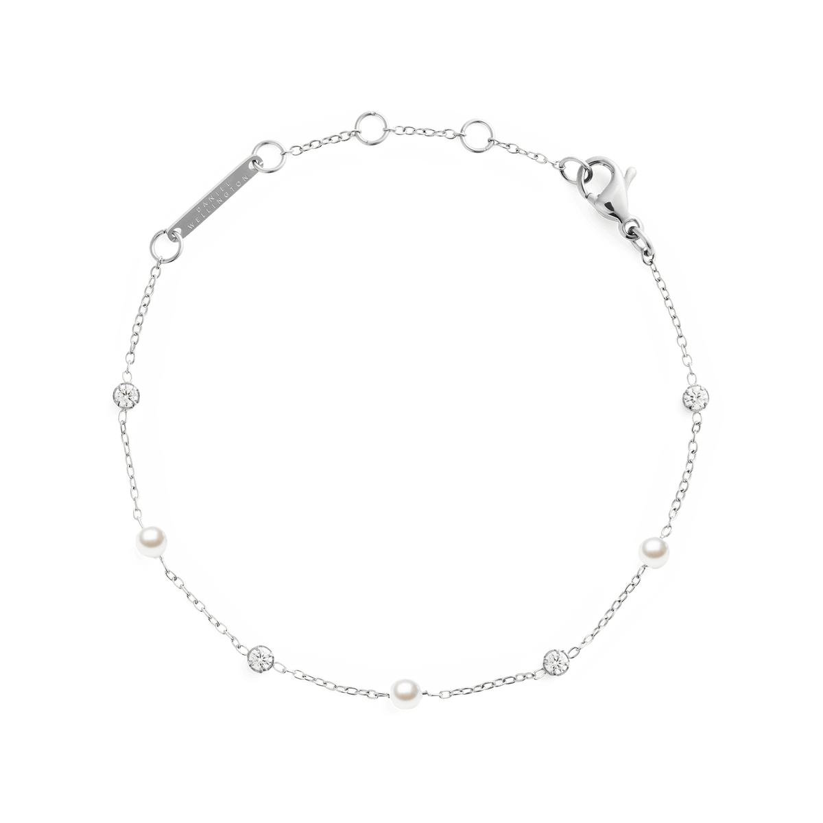 Delicate silver bracelet featuring alternating white Swarovski glass pearls and cubic zirconia on a slim chain, with adjustable links and a secure clasp for a comfortable fit.