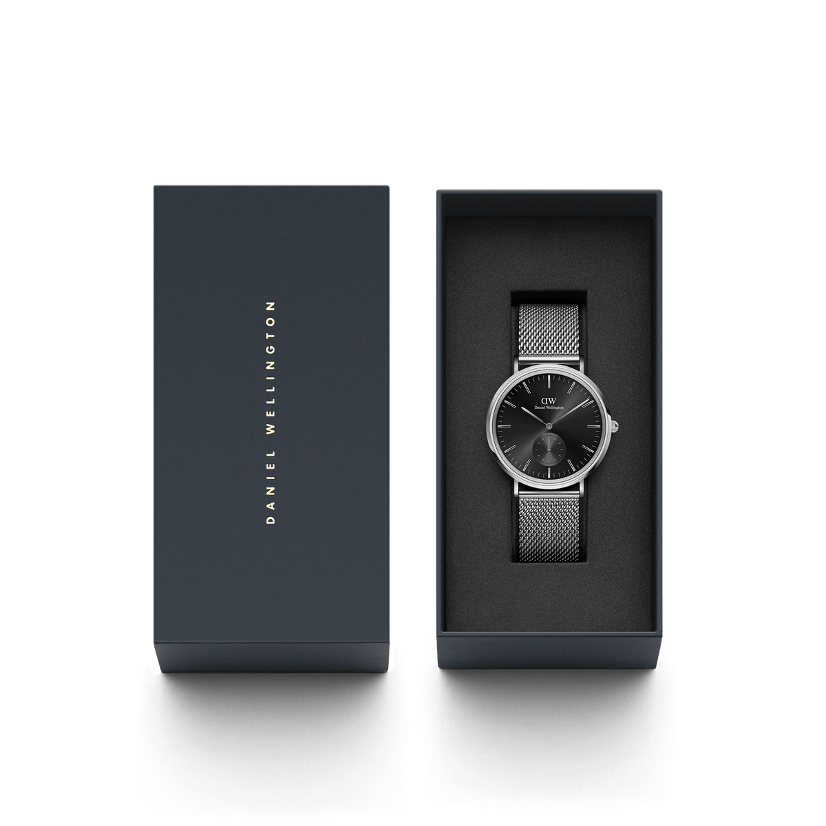 Classic Multi-Eye Sterling Onyx men's watch with a black dial and silver mesh strap, presented in a sleek Daniel Wellington gift box, ideal for gifting or special occasions.