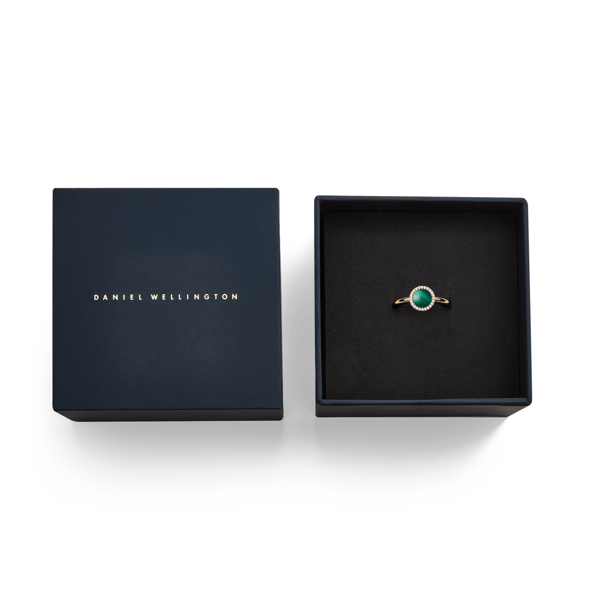 Audrey Ring Malachite Rose Gold presented in an elegant Daniel Wellington gift box, featuring a polished malachite centre stone with a halo of white cubic zirconia on a slim rose gold band.