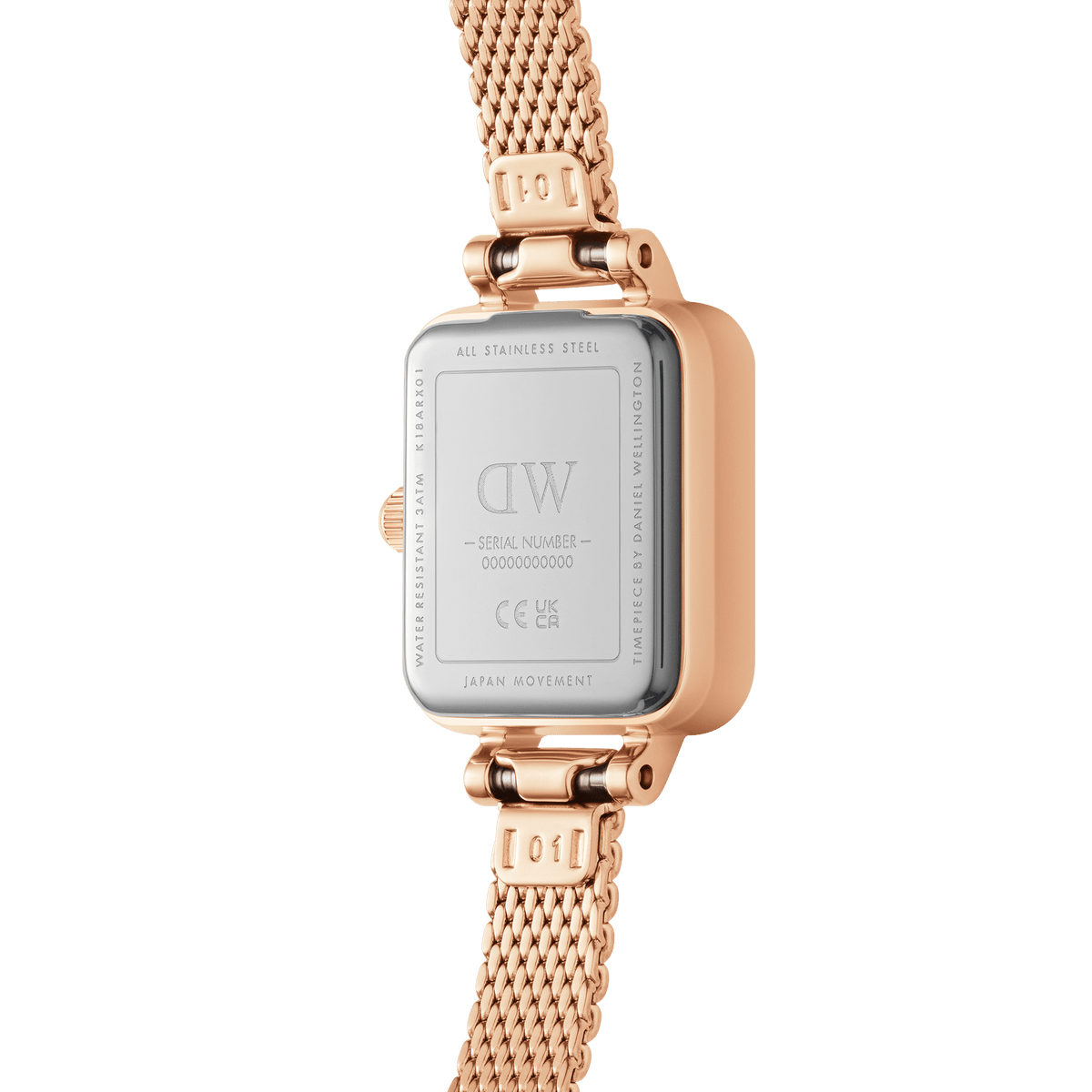 Back view of the Quadro Mini Melrose watch showing the stainless steel case, rose gold mesh strap, engraved details, and water resistance marking.